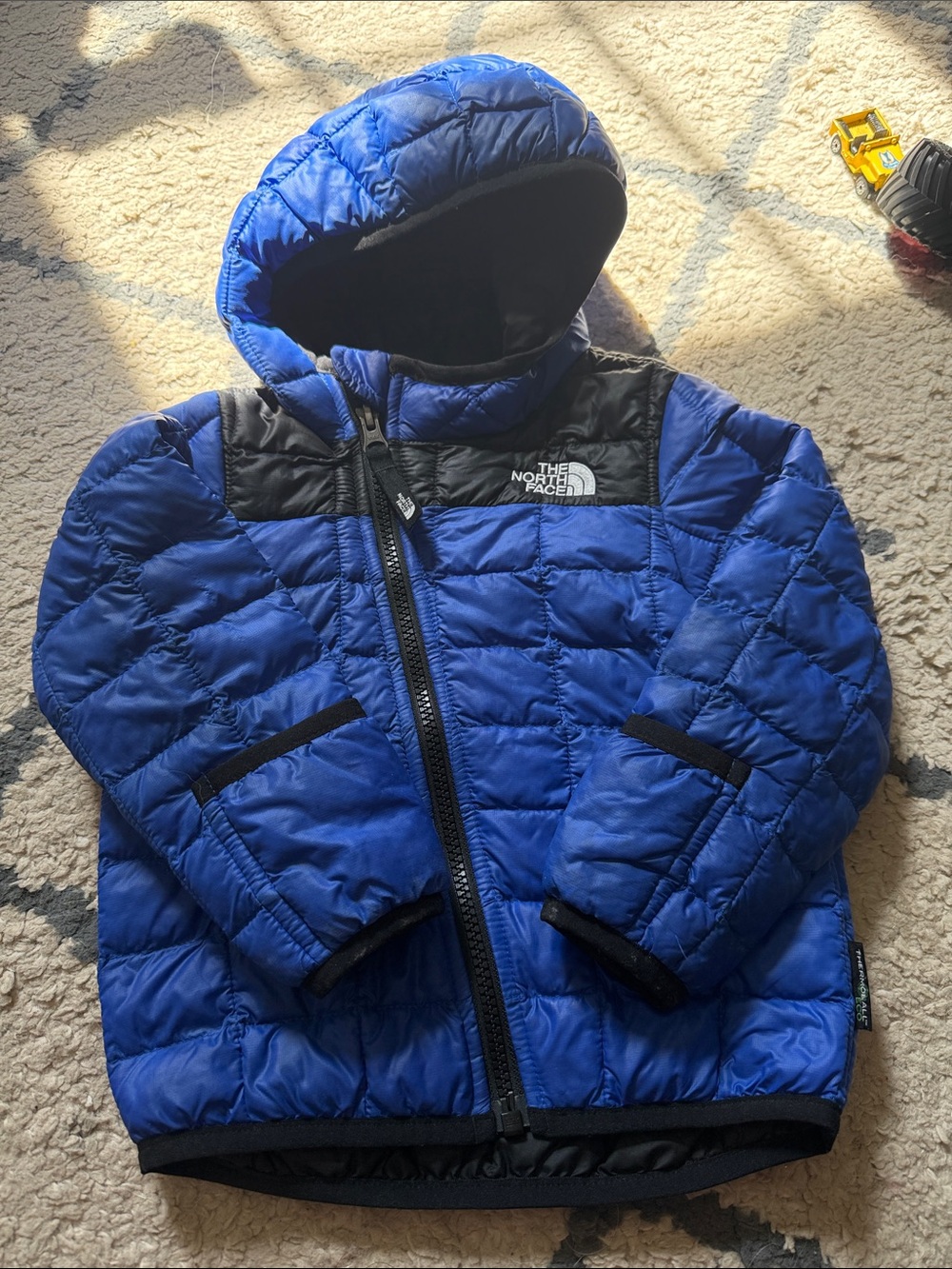 The North Face Kids Blue and Black Hooded Puffer Jacket